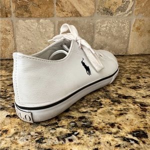 New Ralph Lauren Polo sneakers were gifted to me and did not fit.